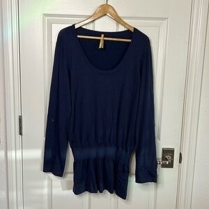 Lole shirt sweater dress. Kinda hard to tell. But super cute with leggings.